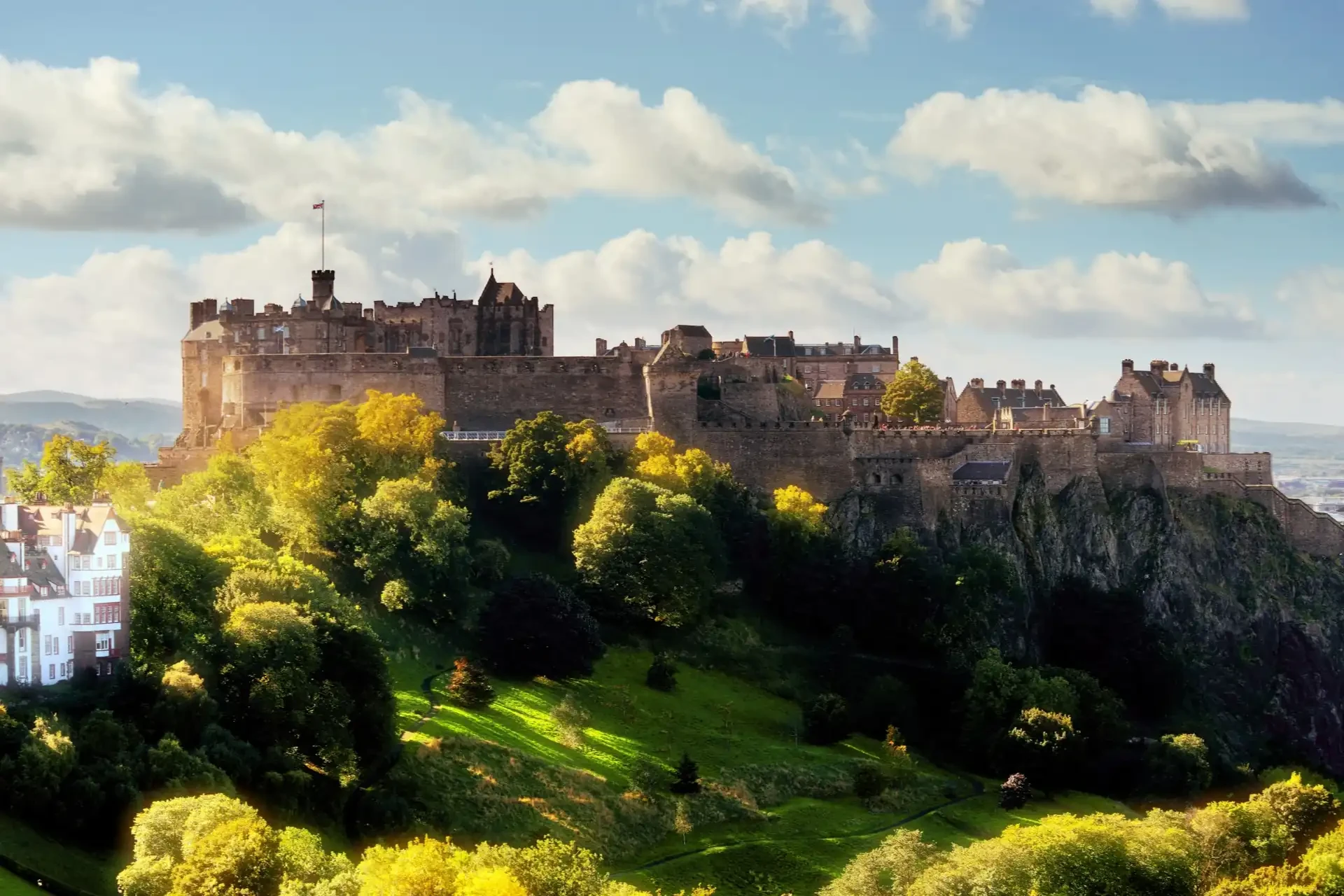 Perched on a hill, Edinburgh Castle overlooks the cityscape with its grand medieval architecture.