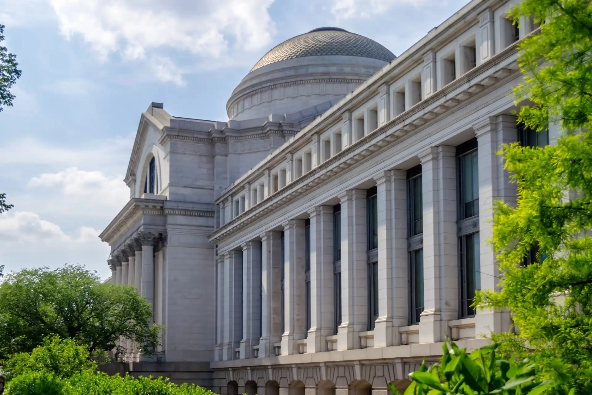 The exterior of a Smithsonian Museum building in Washington, D.C, showcasing architectural details.