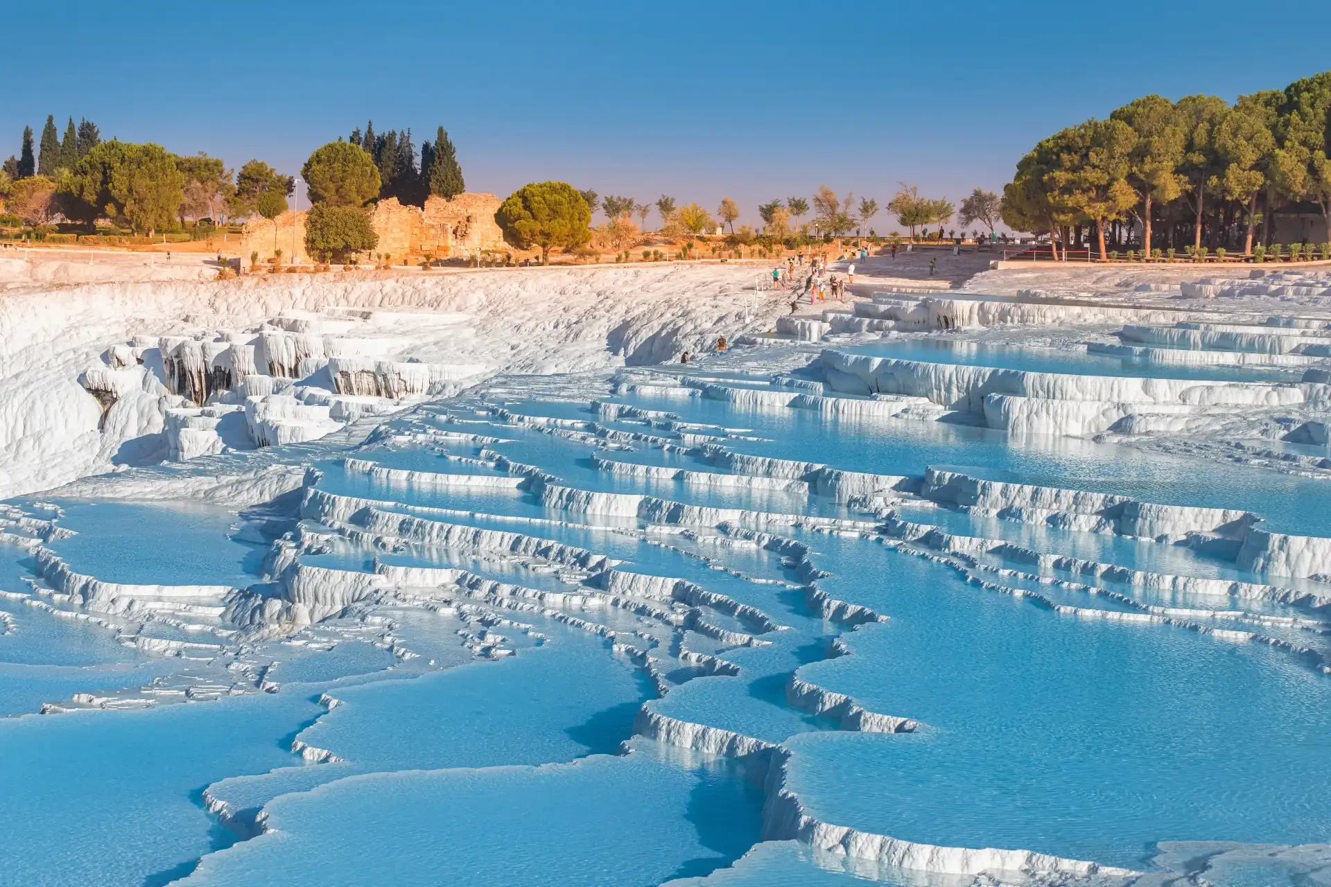 Calcium terraces of Pamukkale, Turkey, known for their white mineral-rich thermal pools, creating a stunning natural wonder.
